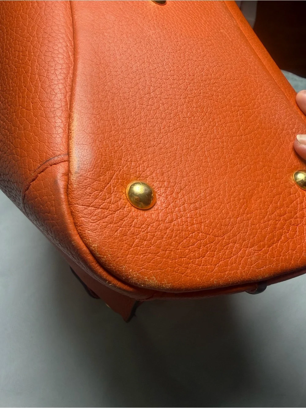 Structured Orange Leather Satchel with Top Handle and Crossbody Strap